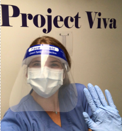 research assistant with face shield on